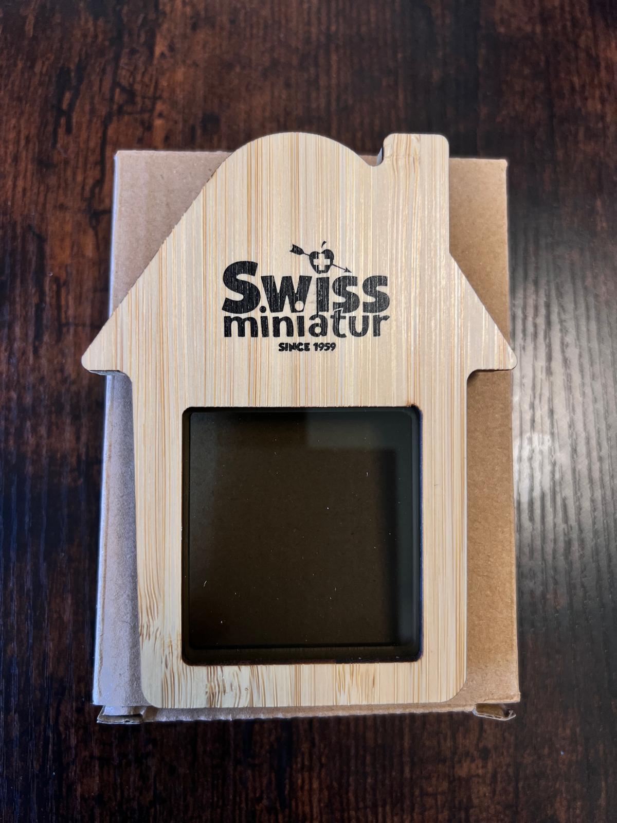 Gadget in legno a forma di casa